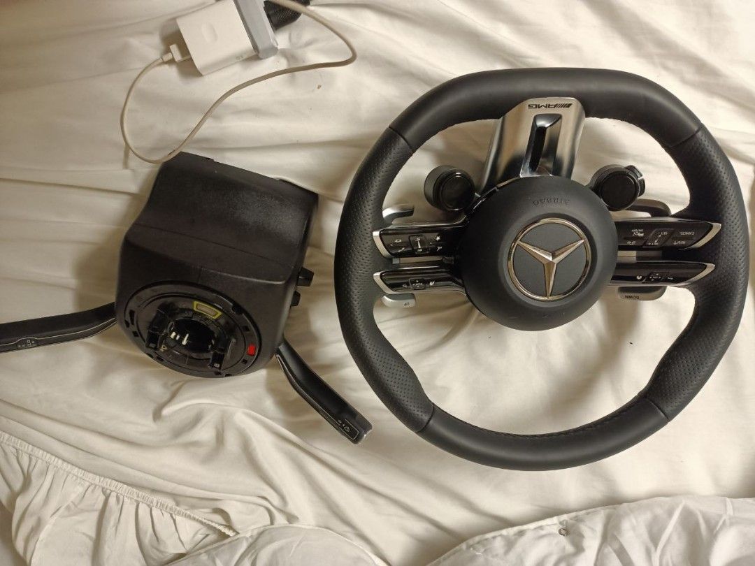 Mercedes AMG (Category: Steering, Brakes, Control Parts and Accessories) located in Manila. Submitted by seabreeze27 (Listing ID 1470931681, Image 1). Description: Selling this steering wheel Kinuha mula sa broken car po Will remove the airbag kasi bawal sa airplane I will be home by December 1st week Offer your price narin.