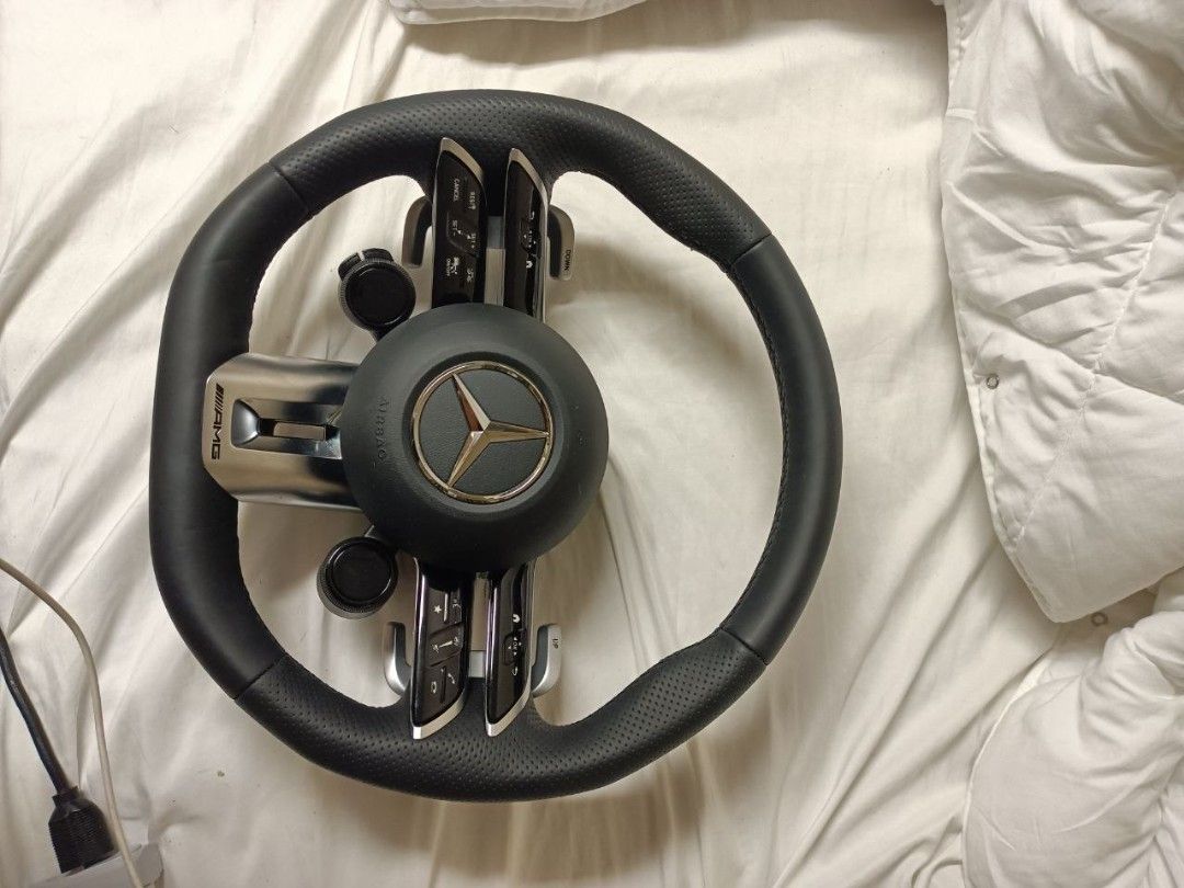 Mercedes AMG (Category: Steering, Brakes, Control Parts and Accessories) located in Manila. Submitted by seabreeze27 (Listing ID 1470931681, Image 2). Description: Selling this steering wheel Kinuha mula sa broken car po Will remove the airbag kasi bawal sa airplane I will be home by December 1st week Offer your price narin.