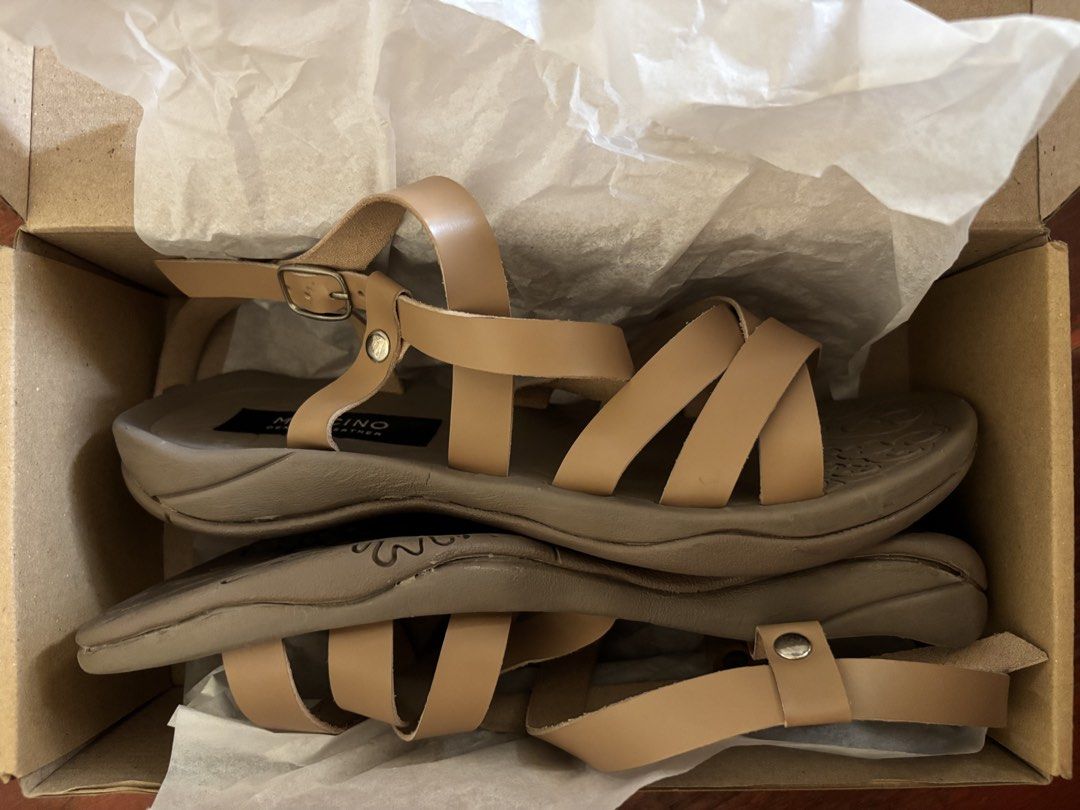Mercino Genuine Leather Sandals Tan Strap Flat (Category: Flats & Sandals) located in Quezon City. Submitted by leahs.stuff (Listing ID 1470816298, Image 2). Description: - Brand: Mercino - Material: Genuine leather in versatile tan - Design: Strappy with secure adjustable ankle buckle - Comfort: Flat sole with textured grip underneath, perfect for everyday wear - Packaging: Includes original box and packaging.