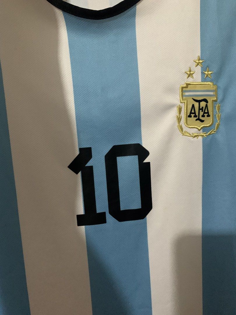 Messi Tee/ Active Wear | Size 16| Striped with Logo (Category: Activewear) located in Taytay. Submitted by chilledcherries (Listing ID 1470747193, Image 3). Description: 👕 Messi Design Shirt 👕 💯 Polyester 👕 Label: Size 16 Made in P. R. C. 👕 Bought in U.A.E. 👕Dimension: length 28in/ width 18inches ✅ Shipping / Delivery c/o Buyer - J&T Express Shipping 📦 or - Lalamove Delivery 🛵.