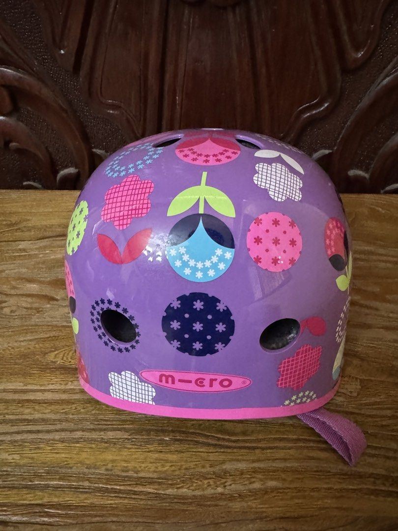 Micro Floral Purple Helmet Size 53-57cm (Category: Bicycles) located in Las Pinas. Submitted by emdjss (Listing ID 1470773609, Image 1). Description: - Vibrant purple kids helmet with colourful floral graphics - Model: FCJ-301, Style: AC2075 - Size: 53 to 57 cm - Weight: 460 grams - Certified to EN1078 and U.S. CPSC safety standards - Pink adjustable straps with convenient quick-release buckle - Built-in top and side ventilation holes for maximum