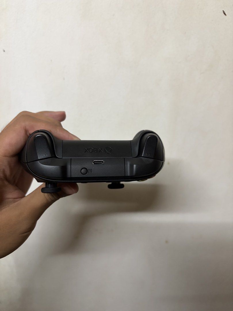 Microsoft Xbox Wireless Controller Carbon Black (Category: Controllers) located in Manila. Submitted by lamineyamal723 (Listing ID 1470849702, Image 2). Description: - 100% Original Microsoft Xbox Controller in Carbon Black - Fully tested and 100% functional - Clean matte finish with standard layout (dual thumbsticks, d-pad, ABXY) - Textured grips on bumpers and triggers for better control - USB-C port and pairing button at the top - comes with x