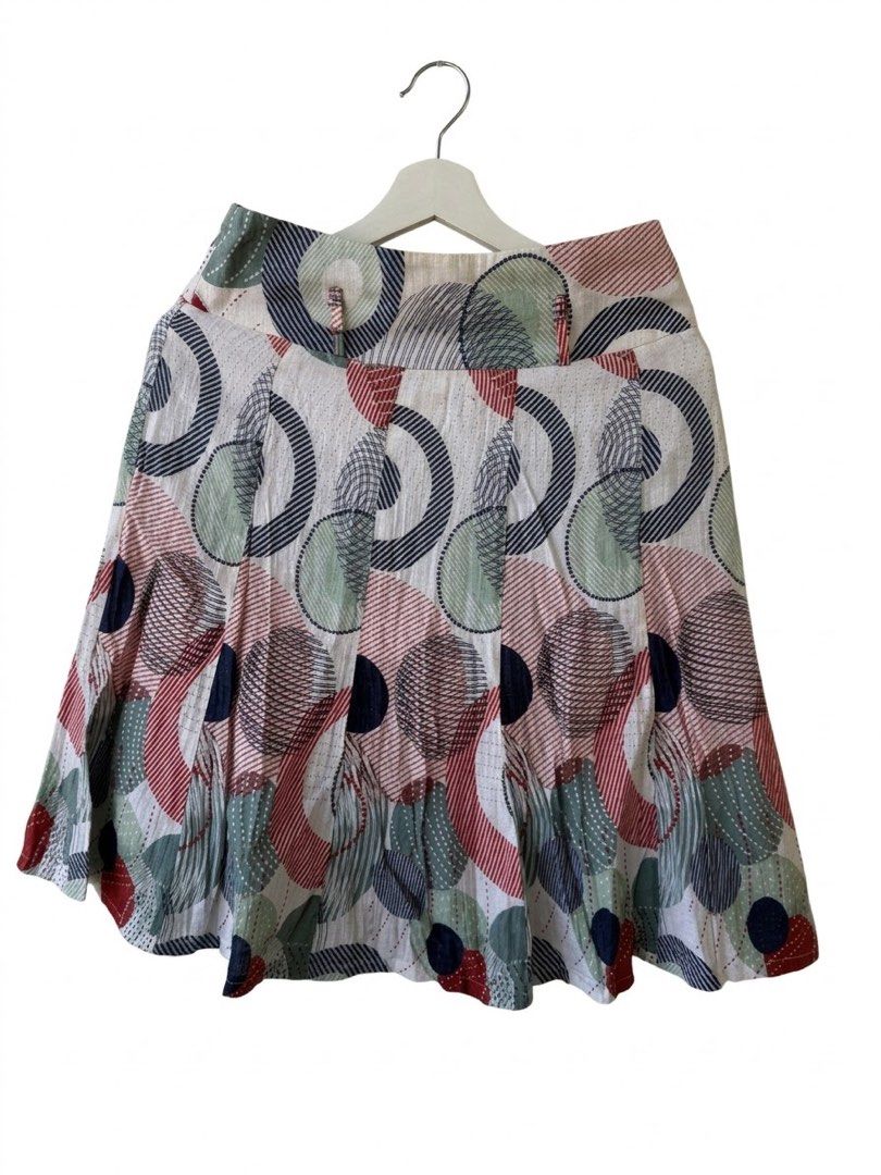 Midi Skirt Patterned (Category: Skirts) located in Taguig. Submitted by luxeria_ (Listing ID 1470782160, Image 1). Description: - Eye-catching geometric circle pattern in navy, green, red, and pink - Pleated design for beautiful movement and flare .