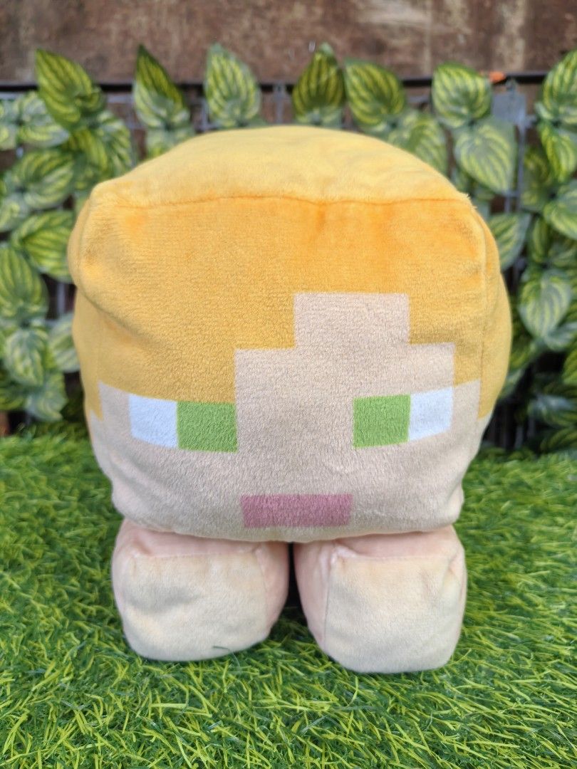 Minecraft Alex character plush soft toy doll approx 35cm (Category: Plushies & Soft Toys) located in Paranaque City. Submitted by furugiyafinds (Listing ID 1470792921, Image 1). Description: - Official Minecraft Alex plush toy with attached tag - Features iconic blocky head, green shirt, brown pants, and grey felt wings - Made with soft, high-quality fabric and detailed pixelated design - Clean condition, no tears, no stains - Perfect for gamer c