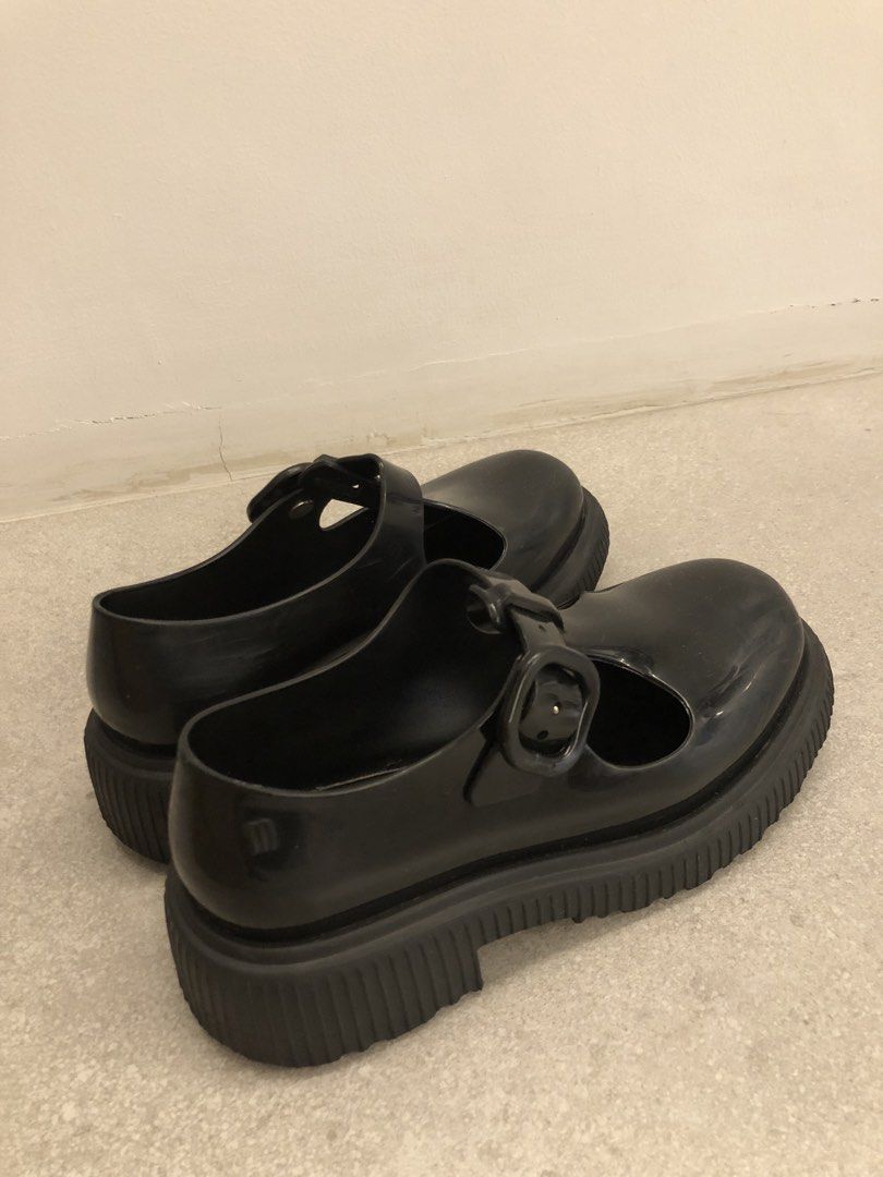 Mini Melissa Black Mary Jane Platform Shoes (Category: Babies & Kids Fashion) located in Angeles City. Submitted by formomandbaby (Listing ID 1470860142, Image 3). Description: - Brand: Mini Melissa - Style: Black Mary Jane platform shoes with chunky lug sole and buckle strap - Size: EUR 31 / US 13 - Material: Durable vegan plastic - Inclusion: Original branded shoebox - Condition: Great for kids' everyday wear.