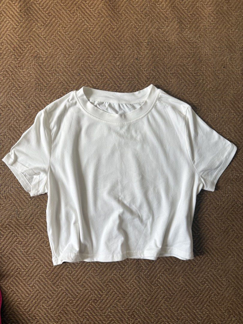 Minimalist Plain White Cropped Tee | Daily OOTD (Category: Shirts) located in Cavite. Submitted by shopnshinebyelle (Listing ID 1470761337, Image 1). Description: ♡ Brand new, never used — stored only ♡ Color: Dirty white ♡ No damage; in good condition ♡ Fits up to a medium-framed girlie (For further questions about its size and measurements, kindly message us) ♡ First to pay, first to get the item. ♡ Shipments are every weekend. (Kung gusto maip