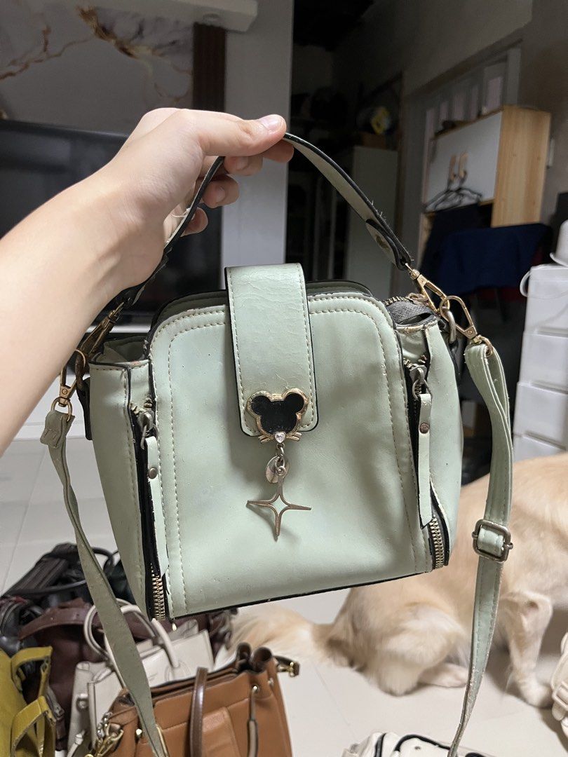 Mint Green Crossbody Bag with Mickey Charm (Category: Cross-body Bags) located in General Trias. Submitted by walterwhiteyo (Listing ID 1470763777, Image 1). Description: see photos for the condition pls!.