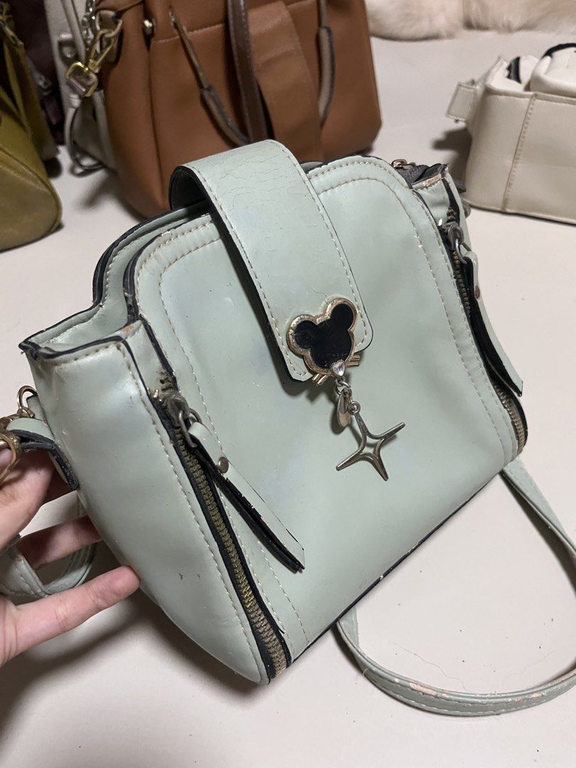 Mint Green Crossbody Bag with Mickey Charm (Category: Cross-body Bags) located in General Trias. Submitted by walterwhiteyo (Listing ID 1470763777, Image 3). Description: see photos for the condition pls!.