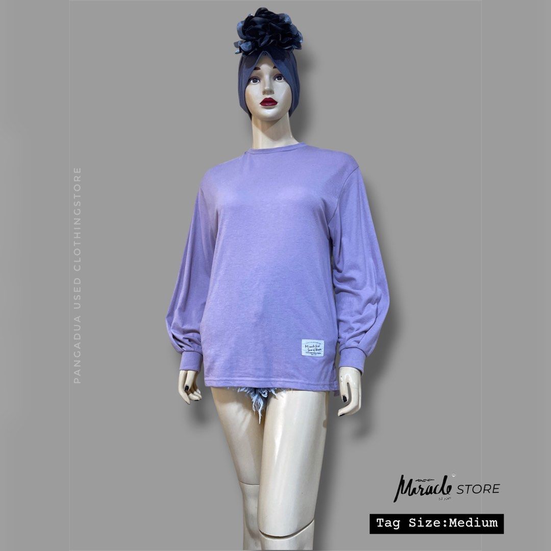 Miracle Bird Purple Long Sleeve Sweatshirt Medium (Category: Longsleeves) located in Naga. Submitted by 2ndusedclothingstore (Listing ID 1470851927, Image 1). Description: - Brand: Miracle Bird - Size: Medium - Color: Purple - Style: Crew neck with gathered balloon sleeves - Fit: Relaxed casual fit - Material: Soft cotton fabric blend - Details: Small woven brand patch near the bottom hem - Condition: Great everyday piece.