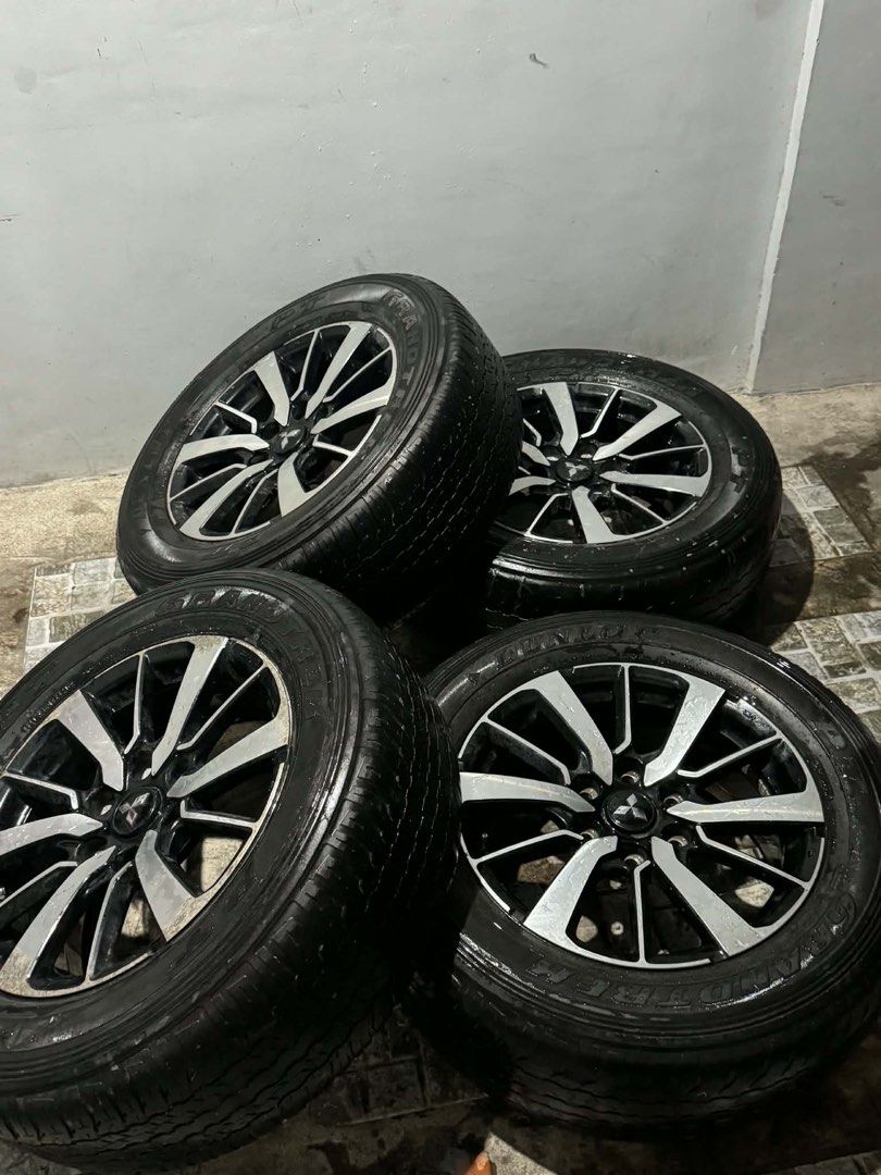 Mitsubishi stock mags (Category: Mags and Tires) located in Quezon City. Submitted by kween_g (Listing ID 1470762150, Image 1). Description: FOR SALE ! Stock Mags & Tires for Mitsubishi Montero Sport. Good condition!.