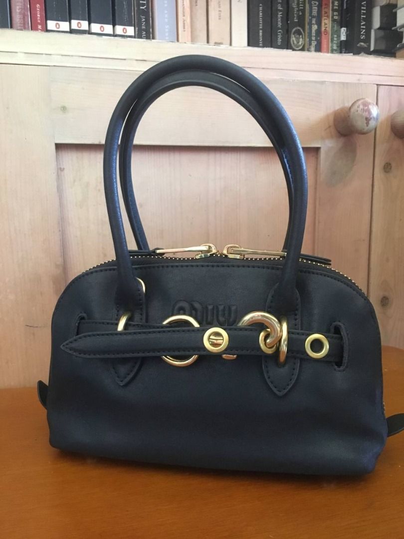 Miu Miu Aventure Mini Nappa Leather Bag (Category: Luxury Bags & Wallets) located in Cavite. Submitted by xtina_m (Listing ID 1470772782, Image 1). Description: Miu Miu Aventure Mini Bag - Source: Pre-owned by my Ate, dibs ko sa padala nya. - RFS: Doesn't fit my books or Kindle, barely used it. - Inclusions: Comes with original dust bag and strap - Condition: Excellent..