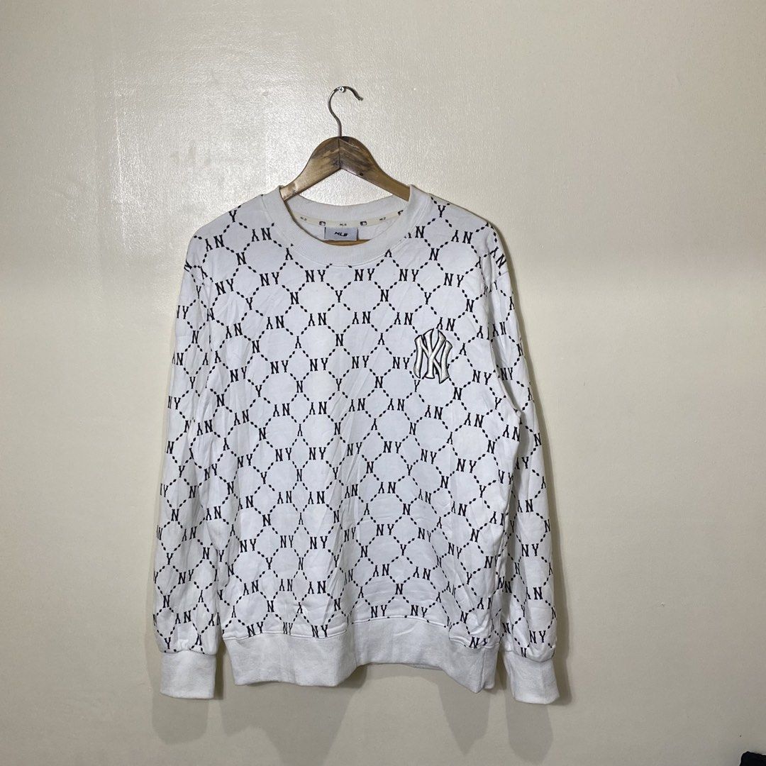 MLB New York Yankees Monogram Sweatshirt White XL (Category: Coats, Jackets and Outerwear) located in Cebu City. Submitted by theloose.thread (Listing ID 1470918521, Image 1). Description: - Brand: MLB New York Yankees - Item: Monogram Crewneck Sweatshirt - Size: XL - Color: Black and white all-over print - Details: Embroidered chest logo, ribbed cuffs, collar, and hem - Material: Cotton and polyester blend - Authenticity: Genuine merchandise tag