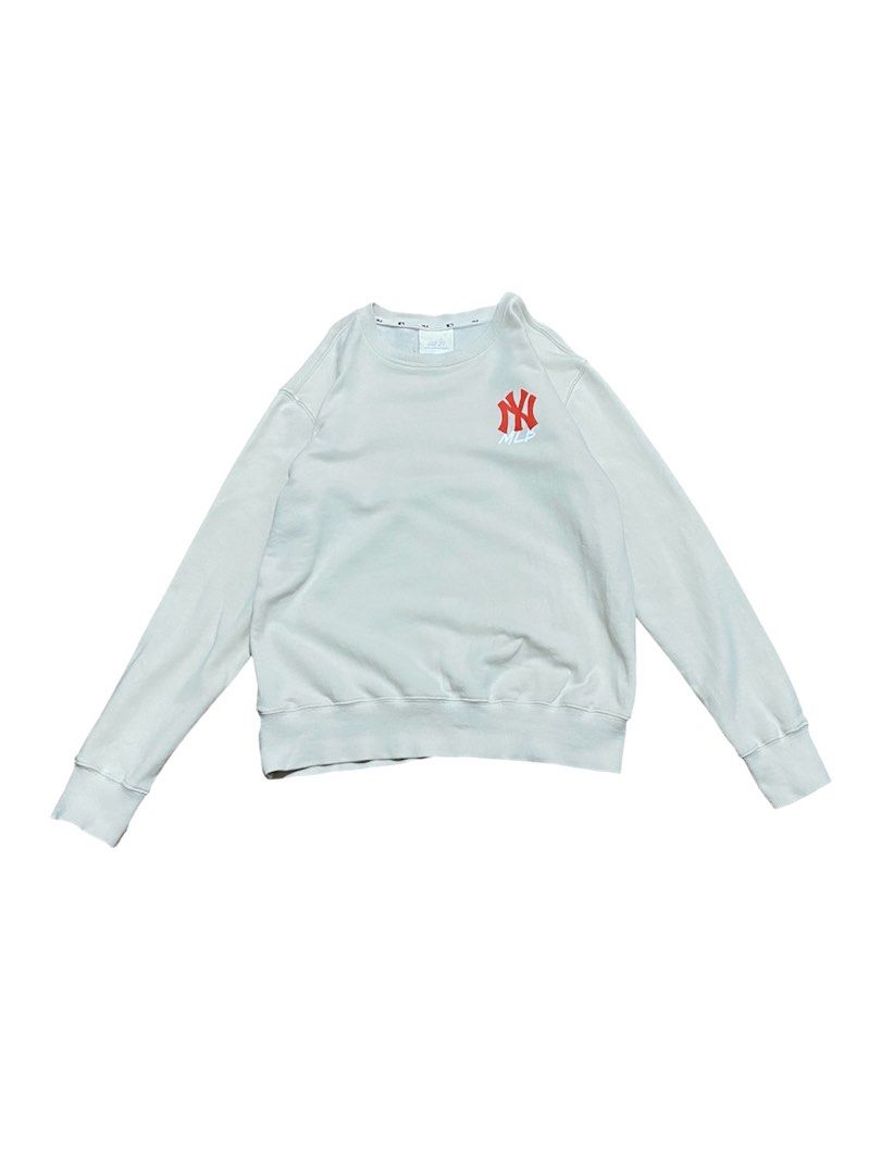 MLB New York Yankees Sweatshirt Cream (Category: Coats, Jackets and Outerwear) located in Baguio. Submitted by arenzu (Listing ID 1470845646, Image 1). Description: - Authentic MLB New York Yankees merchandise - Color: Cream with red accents - Design: Small red NY logo on front chest, big red New York Yankees print on the back - Style: Classic crew neck with ribbed cuffs and hem - Material: Soft, comfortable fabric - Condition: Excellent pre-love