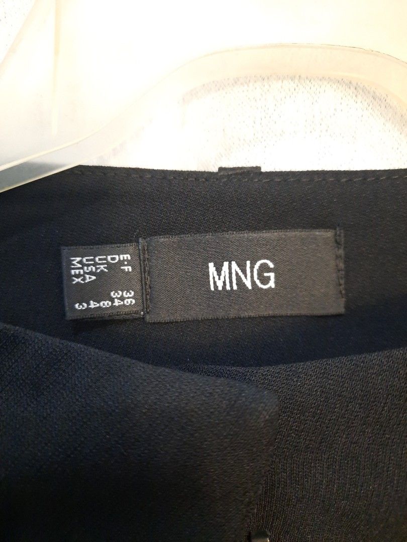 MNG Black Trousers Size UK 8 (Category: Jeans) located in Marilao. Submitted by mariealeiah (Listing ID 1470752506, Image 2). Description: - Brand: MNG - Size: UK 8 / US 4 - Color: Solid Black - Fit: Straight/wide leg with tailored waist - Style: Clean fabric finish, ideal for office and formal wear - Versatility: Easy to match with blouses and shirts.