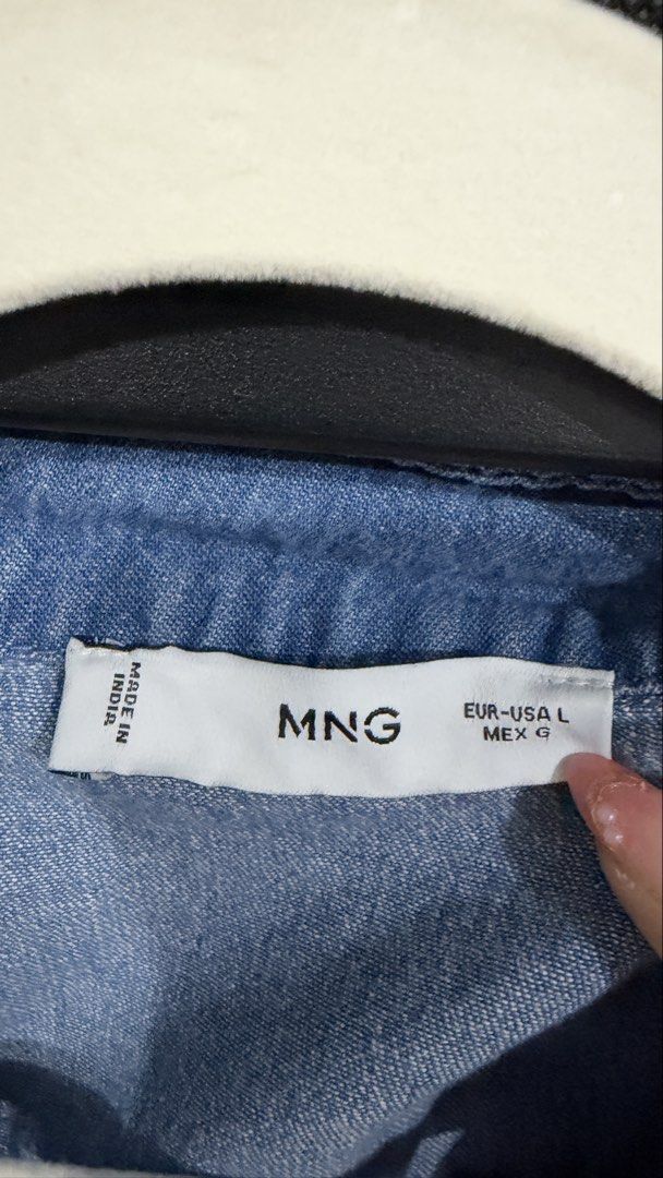 MNG Denim Jumpsuit Size L (Category: Jumpsuits) located in Quezon City. Submitted by dalynsantos (Listing ID 1470879642, Image 2). Description: - Brand: MNG - Size: L - Material: Denim (Made in India) - Design: Short sleeves, collar neckline, and front button closure - Fit: Comfortable elastic waistband - Features: Convenient side pockets - Color: Classic Blue.