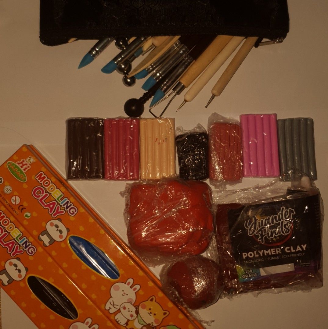 Modeling and Polymer Clay w Tools (Category: Craft Supplies & Tools) located in Unisan. Submitted by l.edea (Listing ID 1470897880, Image 1). Description: Inclusions: 20+ carving tools 2 125g Navy blue Modeling Clay 2 125g Black Modeling Clay Polymer clay (randomised).