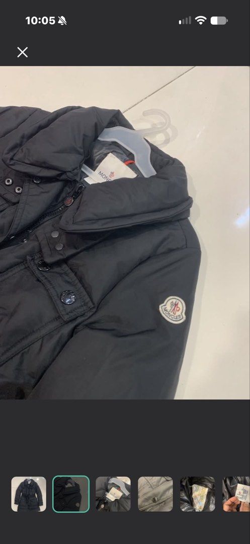 MONCLER Black Puffer Jacket with Belt (Category: Luxury Apparel) located in Manila. Submitted by ann_kia (Listing ID 1470902843, Image 2). Description: - Brand: Moncler - Item: Women's Puffer Jacket with Belt - Color: Classic Black - Size: Small (S) - Features: Matching waist belt for a flattering fit, high collar, branded metal snap buttons, and multiple front utility pockets - Details: Signature Moncler sleeve logo patch and iconic cartoon care