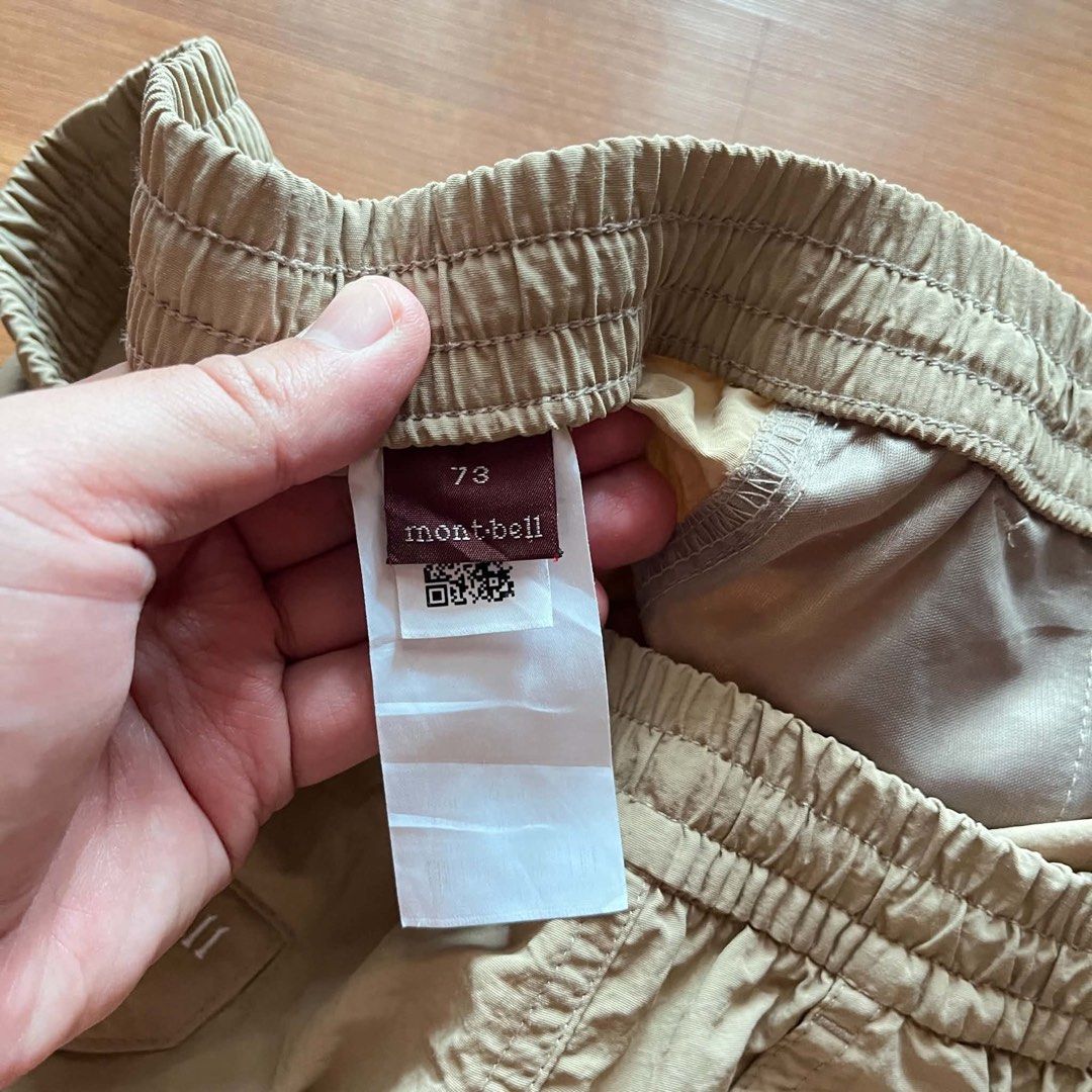 Mont-Bell khaki shorts (Category: Tshirts & Polo Shirts ) located in Caloocan City. Submitted by landcruiser76__ (Listing ID 1470875457, Image 3). Description: - Brand: Mont-Bell - Color: Khaki - Size: 73 - Waist: Elastic waistband with adjustable drawstring - Features: Branded string, back button flap pocket, and embroidered logo detail on the leg - Condition: Excellent pre-owned condition - Perfect for casual wear and outdoor activities Conditi