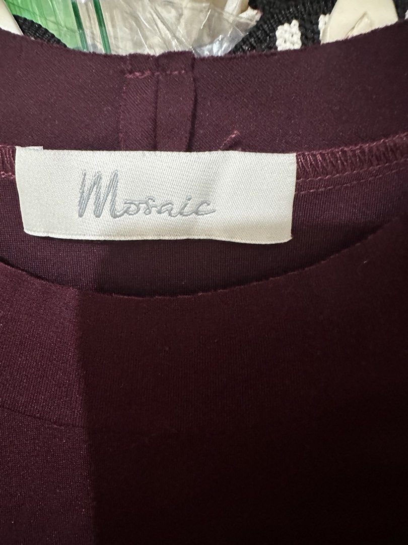 Mosaic Burgundy Batwing Sleeve Blouse (Category: Blouses) located in Balanga. Submitted by jamilbeauty5 (Listing ID 1470751950, Image 3). Description: - Brand: Mosaic - Color: Rich Burgundy - Fit: Relaxed, oversized with wide draped batwing sleeves - Design: Round neckline with chic layered shoulder flap details - Care Instructions: Hand wash cold gently, do not bleach, dry flat in the shade, low iron if needed (wash dark colors separately) - BRa