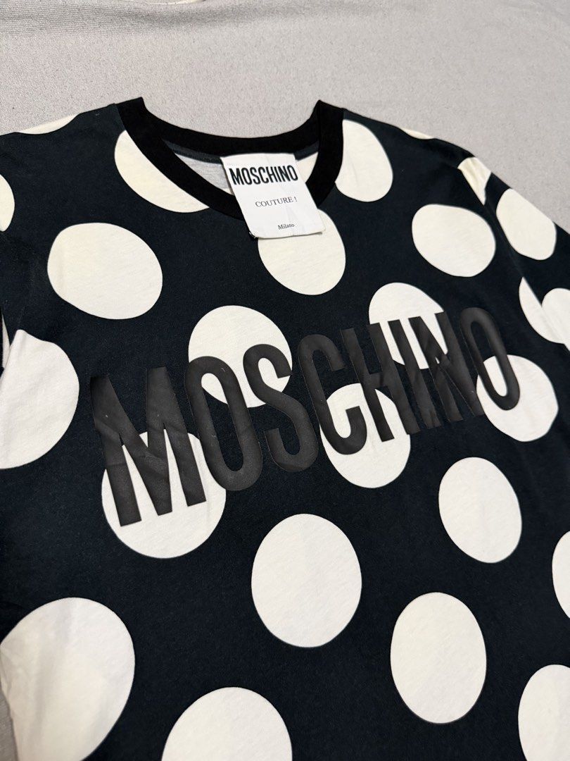 Moschino Embossed AOP Shirt (Category: Luxury Apparel) located in Bulacan. Submitted by sanjisthrift (Listing ID 1470807997, Image 2). Description: Size Medium Width 20 Length 27.5 Excellent Condition 9/10.