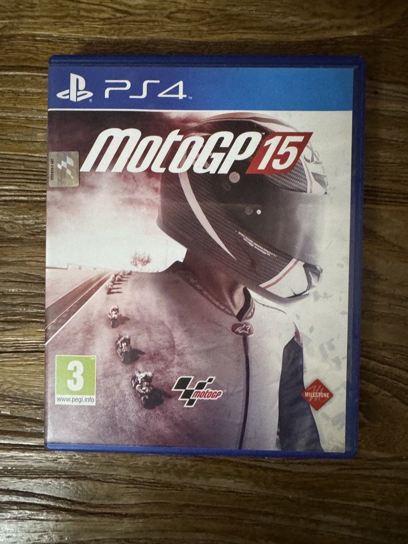 MotoGP 15 PS4 Game (Category: PlayStation) located in Las Pinas. Submitted by emdjss (Listing ID 1470804543, Image 1). Description: - Platform: PlayStation 4 (PS4) - Condition: Great shape, includes both original case and disc - Game Modes: Single-player, career mode, and online multiplayer - Special Features: Real historical events and realistic motorcycle racing physics - Rating: PEGI 3 (Note: Packaging features French and Dutch text).