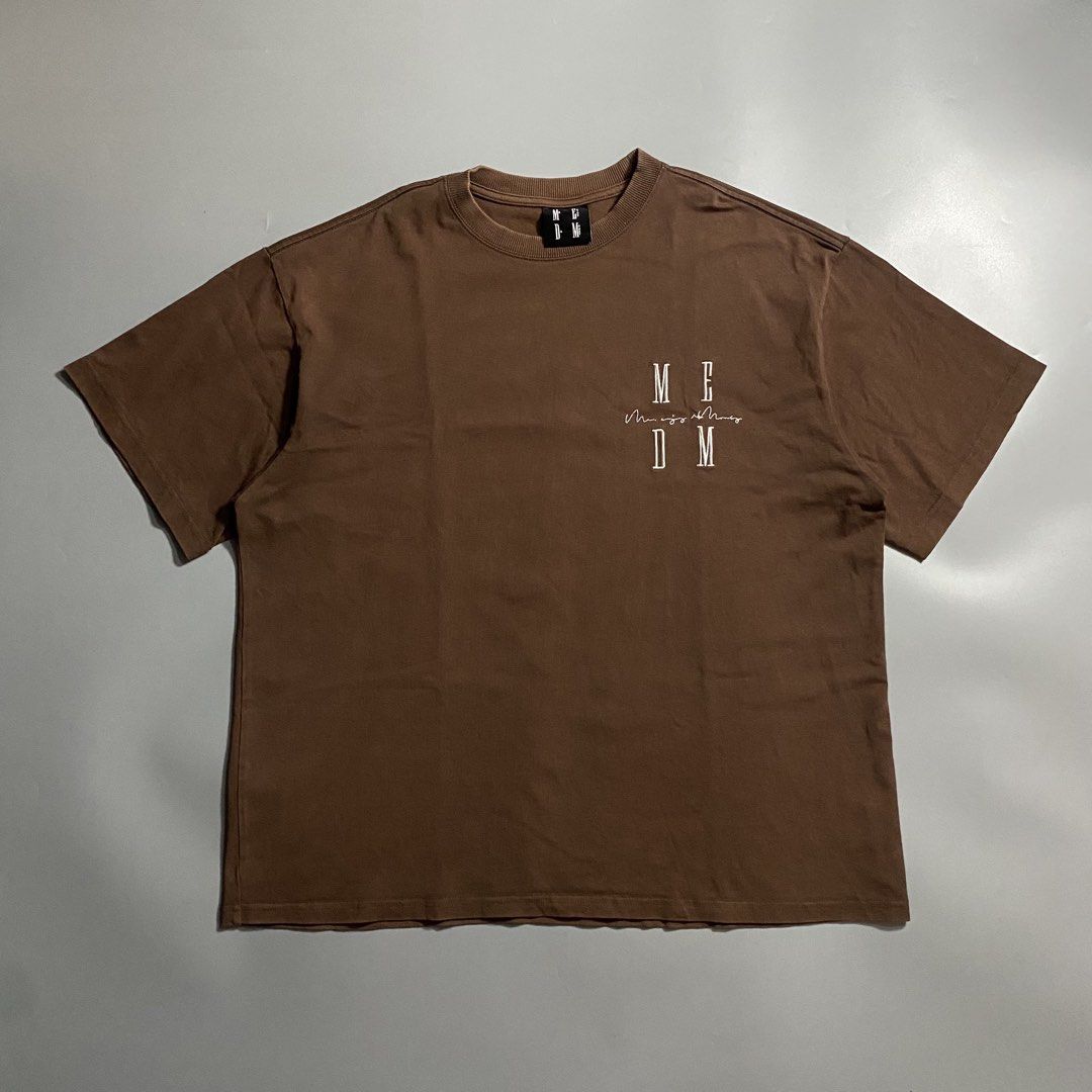 Mr. Enjoy Da Money Oversized Choco Brown Tee (Category: Tshirts & Polo Shirts ) located in Manila. Submitted by curatedvg. (Listing ID 1470860556, Image 1). Description: MEDM Choco Brown Shirt Width: 24 inches Length: 28 inches Size L - XL Excellent condition No issues.