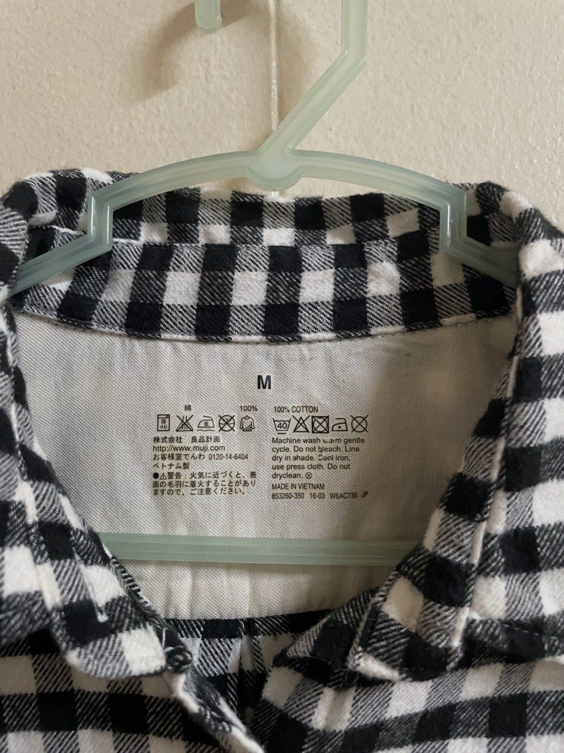 Muji Black Checkered Button Shirt (Category: Tshirts & Polo Shirts ) located in Makati City. Submitted by pepperstoremerch (Listing ID 1470800207, Image 2). Description: Muji Black Checkered Button Shirt Size Medium 100% Cotton Preloved, good condition Please see pictures D0124 P261028R50C21 .