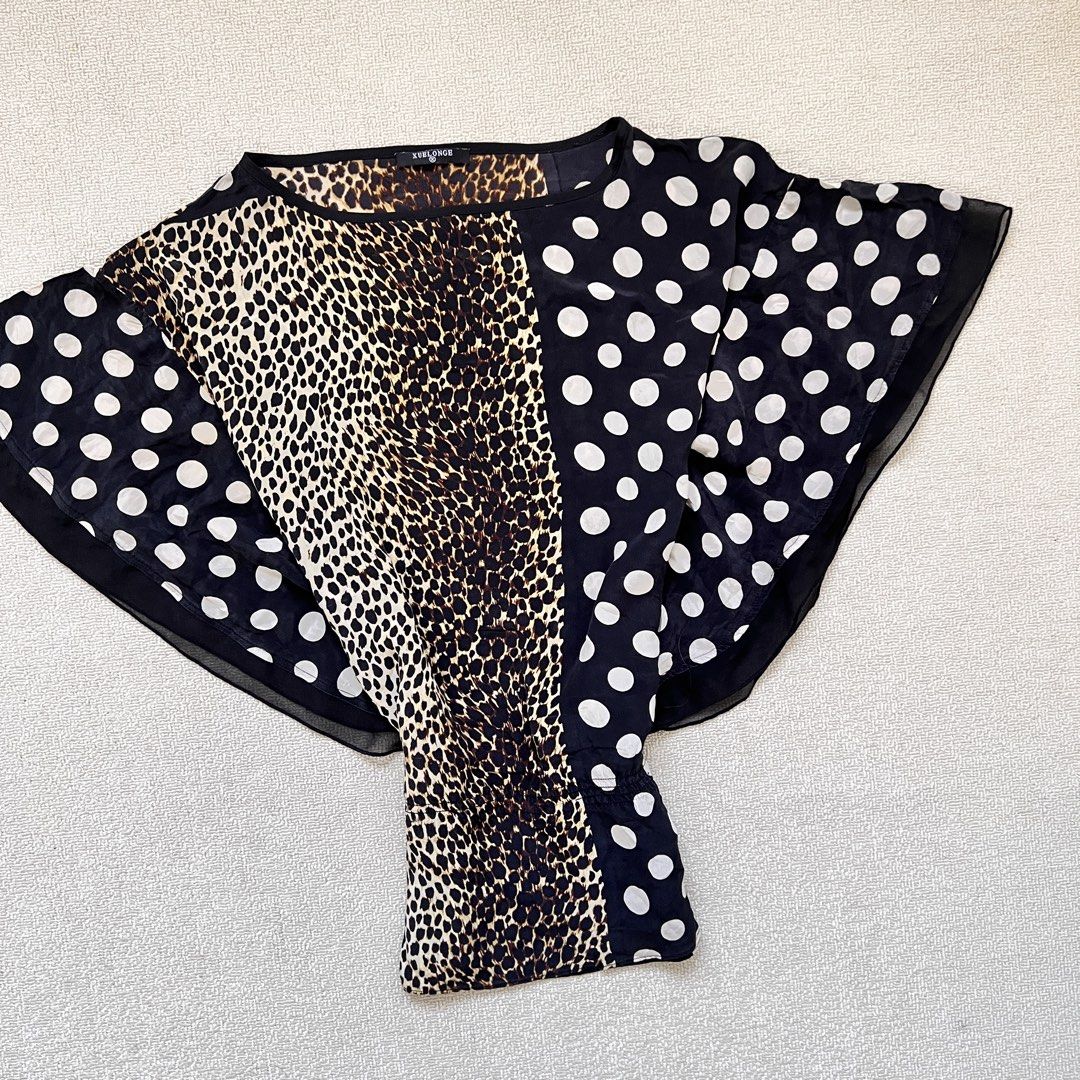 multi-print leopard & polkadot silk like poncho (Category: Blouses) located in Limay. Submitted by budolfindsrawrawr (Listing ID 1470785377, Image 2). Description: multi-print leopard & polkadot silk like poncho - fits s/m l25 bust freesize - in excellent condition .