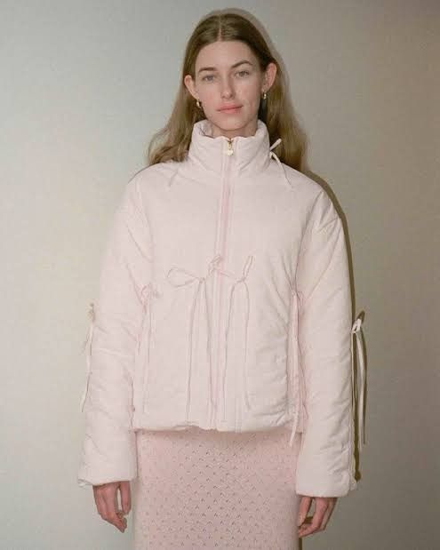 Mum Made It Pink Puffer Jacket with Bows (Category: Coats, Jackets and Outerwear) located in Makati City. Submitted by another_wear (Listing ID 1470800288, Image 1). Description: Brand new and never worn! This is really the cutest winter puffer jacket! Perfect for ballet core looks while being protected from the cold. Size XS but oversized fit so I would say this could fit up to M. I forgot the original price already but I think it was around 10K