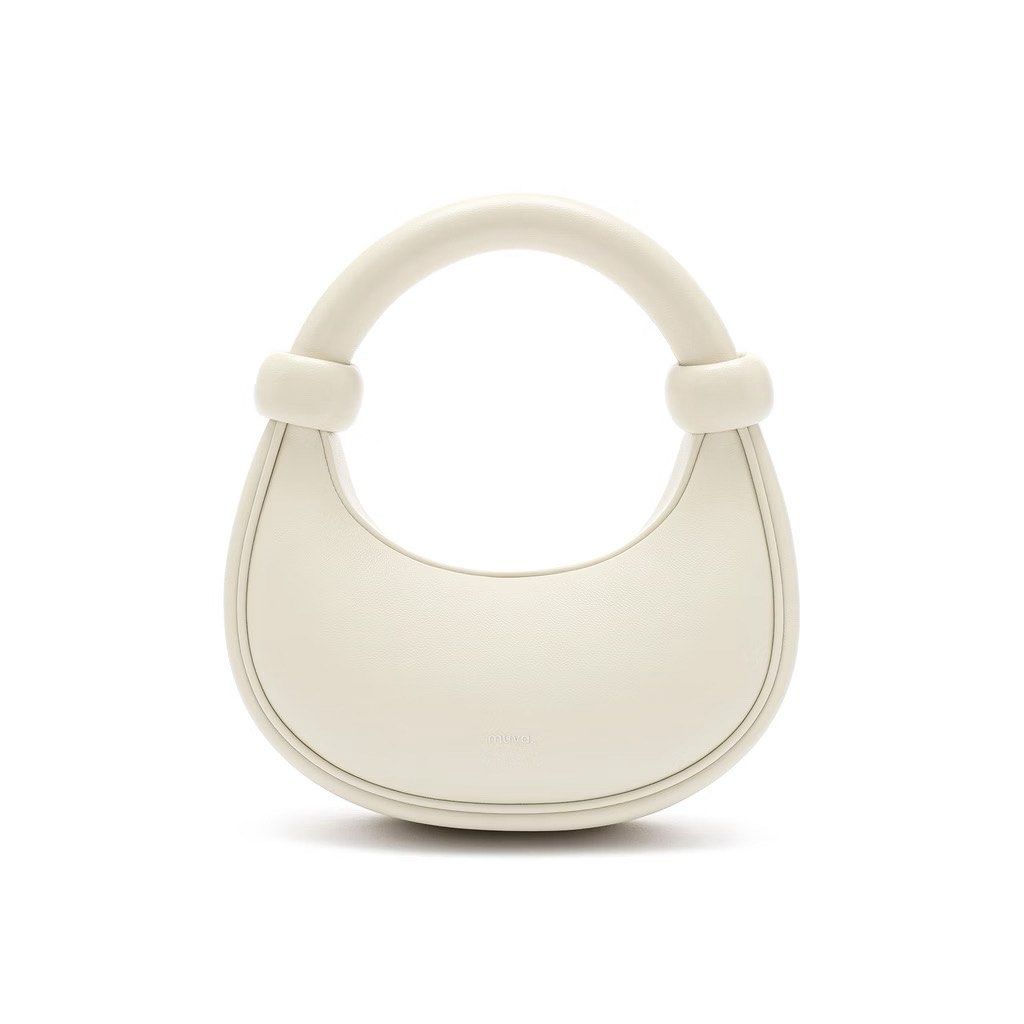 Muva Crescent Leather Handbag in White (Category: Shoulder Bags) located in Davao. Submitted by butterflyfairry (Listing ID 1470915525, Image 1). Description: - Muva Crescent handbag In White - Complete with dust bag and bag sling - Has a minor flow but barely noticeable ( check photos for reference ) - Bought this in Thailand 2025 for 2,400 baht - Used only for special events Davao based :) .