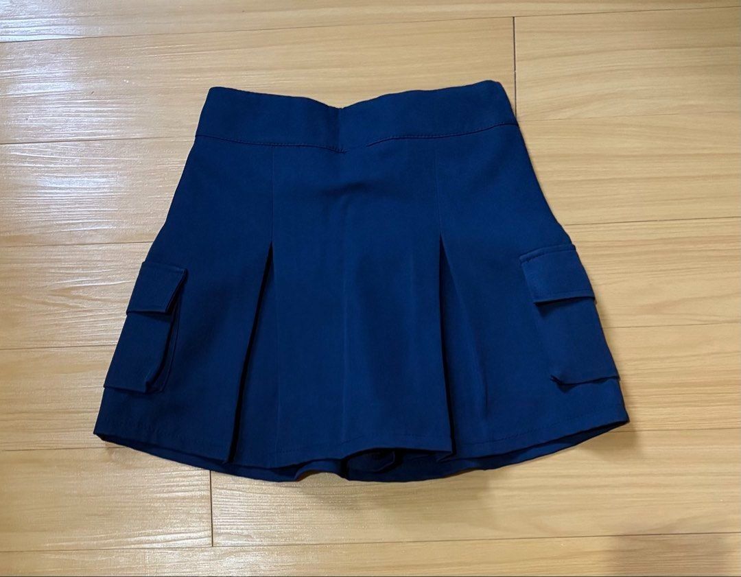 Navy Blue Cargo Pleated Skort Size 25-30 (Category: Skirts) located in Quezon City. Submitted by garagesale2026 (Listing ID 1470782748, Image 1). Description: - Unused, washed - With built-in shorts - Garterized back waist - From Bangkok.