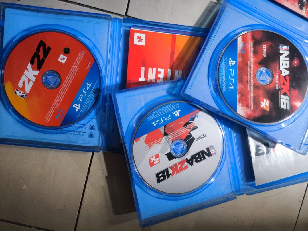 NBA 2K Bundle PS4 NBA 2K16 NBA 2K18 NBA 2K22 (Category: PlayStation) located in Manila. Submitted by jleeong (Listing ID 1470794092, Image 3). Description: - PS4 basketball game bundle featuring NBA 2K16, NBA 2K18, and NBA 2K22 - Includes original cases and discs for all three titles - Discs are tested and in 100% working condition - Great and affordable way to start or add to your collection - Perfect gift for sports gamers and basketball fans.