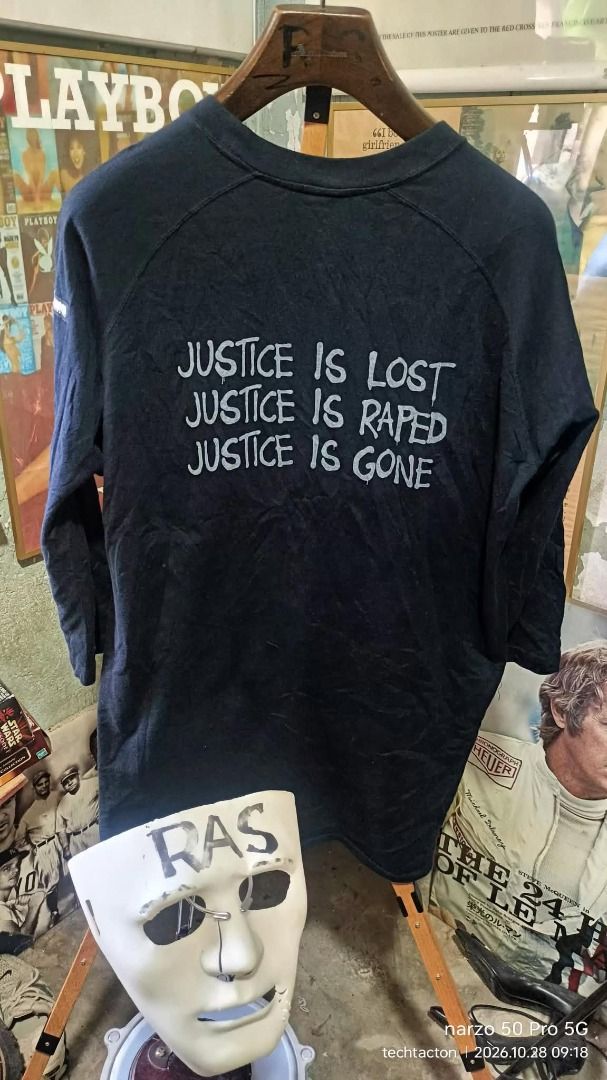 Neighborhood Justice Is Lost Raglan (Category: Longsleeves) located in Santo Tomas. Submitted by pickers_corner (Listing ID 1470752341, Image 2). Description: Authentic Neighborhood Technical Apparel black long-sleeve shirt in 100% cotton. Features a crew neck, raglan sleeves, and a striking back text graphic. Style code TSNH-CS-08..