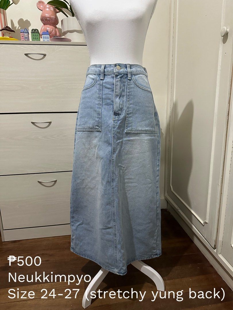 Neukkimpyo Denim Skirt Size 24-27 (Category: Skirts) located in Antipolo. Submitted by wxyz9876 (Listing ID 1470879156, Image 1). Description: - Brand: Neukkimpyo (Made in Korea) - Wash: Light wash denim - Material: 100% cotton - Fit: High waist with stretchy back waistband for extra comfort - Style: Midi length with front pockets and button closure - Condition: Great for pairing with casual tops and tees Bought in Melbourne.