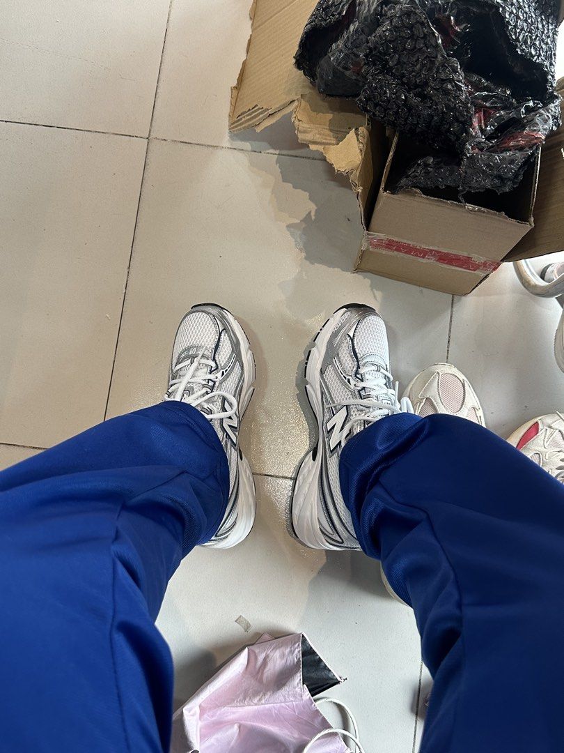 New Balance 740 Silver White Sneakers (Category: Sneakers) located in Cauayan City . Submitted by sherinejoy_ (Listing ID 1470792262, Image 3). Description: - Model: New Balance 740 (Silver/White) - Condition: Worn once briefly, soles are completely clean - Included: Original box - Features: Chunky retro runner style, ABZORB cushioning, breathable mesh upper with metallic overlays - Style: Perfect everyday pair for the trendy tech runner look.