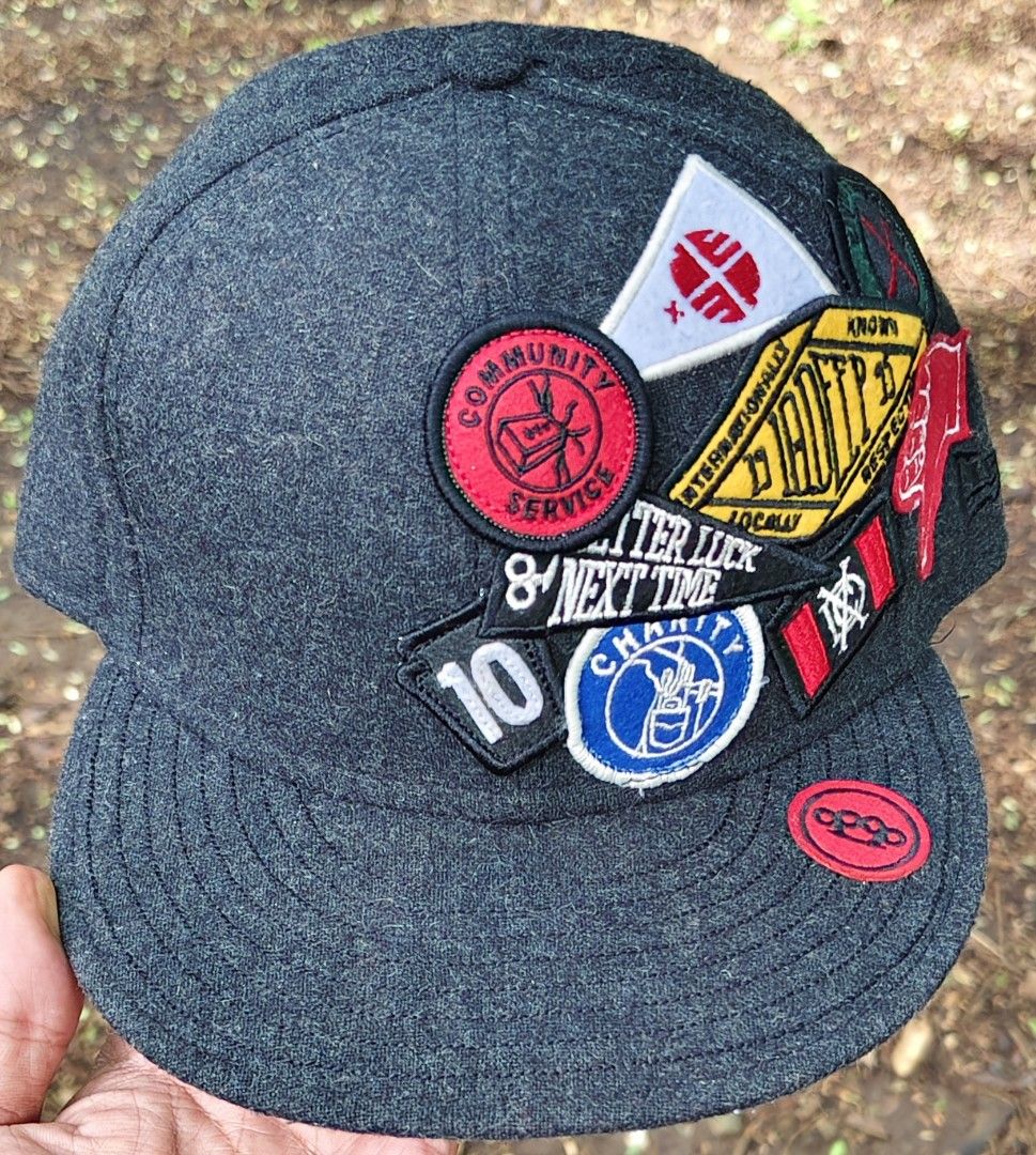 New Era 10 Deep 59FIFTY Fitted Hat Size 7 1/2 (Category: Caps & Hats) located in Manila. Submitted by sansmerci27 (Listing ID 1470903423, Image 1). Description: - Brand: 10 Deep x New Era - Style: Fitted hat with flat brim - Color: Dark grey (wool blend) - Size: 7 1/2 - Details: Colorful patches on front, embroidered logo under brim, original foil size sticker, 59FIFTY interior taping - Condition: Clean, excellent with no flaws.