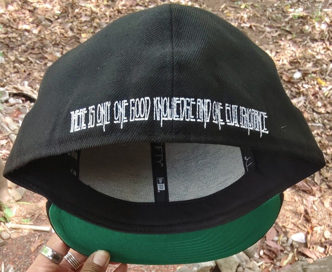 New Era 59FIFTY Black Scale Fitted Cap Size 7 1/2 (Category: Caps & Hats) located in Manila. Submitted by sansmerci27 (Listing ID 1470901909, Image 3). Description: - Brand: Black Scale x New Era 59FIFTY - Size: 7 1/2 (59.6 cm) - Color/Design: Black crown with red embroidered star and wreath graphic on front - Undervisor: Classic green - Back Detail: White embroidered quote "THERE IS ONLY ONE GOOD KNOWLEDGE AND ONE EVIL IGNORANCE" - Condition: In