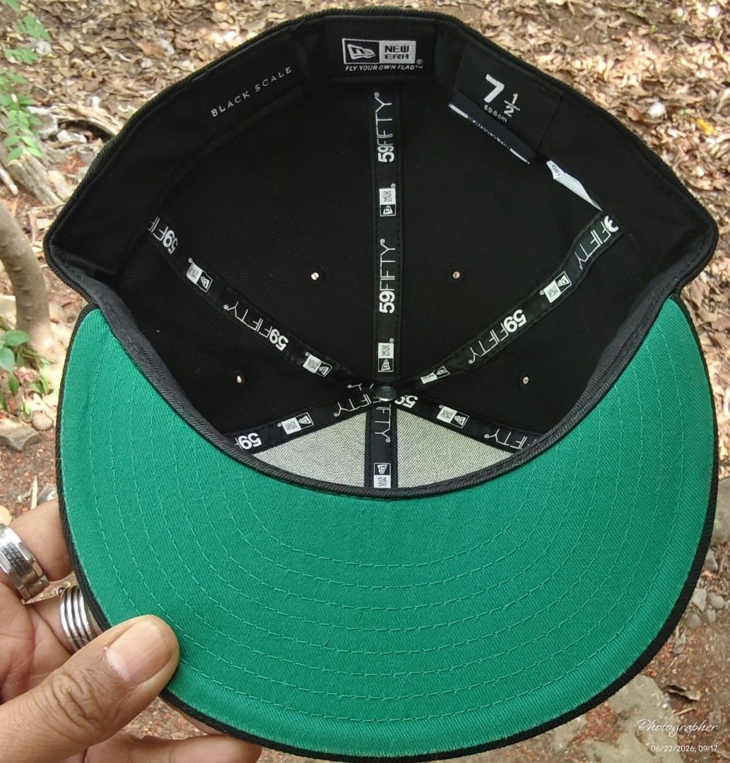 New Era 59FIFTY Black Scale Fitted Cap Size 7 1/2 (Category: Caps & Hats) located in Manila. Submitted by sansmerci27 (Listing ID 1470901909, Image 2). Description: - Brand: Black Scale x New Era 59FIFTY - Size: 7 1/2 (59.6 cm) - Color/Design: Black crown with red embroidered star and wreath graphic on front - Undervisor: Classic green - Back Detail: White embroidered quote "THERE IS ONLY ONE GOOD KNOWLEDGE AND ONE EVIL IGNORANCE" - Condition: In