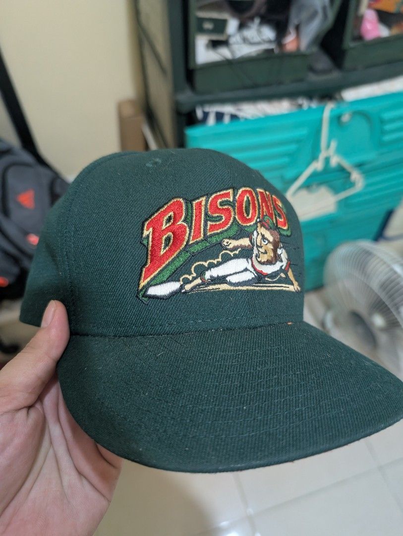 New Era Bisons Fitted Hat Size 7 1/4 (Category: Caps & Hats) located in Del Monte. Submitted by emman08255 (Listing ID 1470846490, Image 1). Description: - Brand: New Era 59FIFTY - Team: Buffalo Bisons (Embroidered front) - Color: Green and Red - Size: 7 1/4 (57.7 cm) - Material: 100% polyester, made in China - Condition: Clean structure overall with minor sweatband staining from wear.