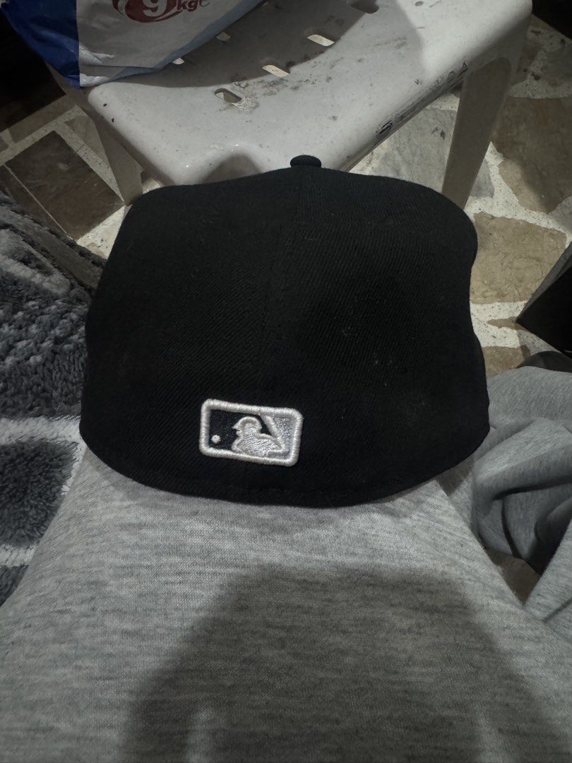 New Era Chicago White Sox 59FIFTY Fitted Cap (Category: Caps & Hats) located in Manila. Submitted by boldstar-f643f3 (Listing ID 1470879971, Image 3). Description: - Brand: New Era - Team: Chicago White Sox - Style: 59FIFTY structured fitted cap with flat brim - Color: Classic black with white embroidery - Size: 7 5/8 - Details: Features interior branding taping and official MLB batterman logo on the back.
