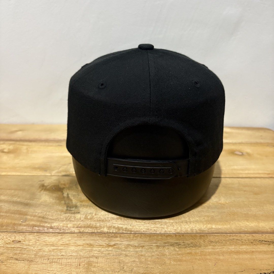 New York Yankees MLB Black Snapback Cap (Category: Caps & Hats) located in Dapitan. Submitted by payt3es_thrift. (Listing ID 1470851620, Image 3). Description: 🧢 NEW YORK YANKEES MLB BASEBALL CAP 🖤⚾ Sleek all-black Yankees design with premium-looking metal logo detail ✅ MLB / Major League Baseball ✅ New York Yankees ✅ Made in Korea 🇰🇷 ✅ Free Size / 50L ✅ Adjustable snapback ✅ Black-on-black colorway ✅ Metal NY logo at the front ✅ Yankees scri
