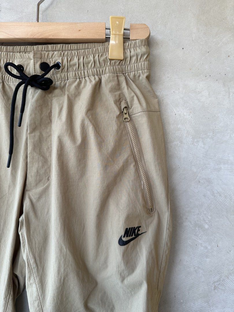 NIKE - Small Logo Pattern Woven Pants (Category: Trousers) located in Cavite. Submitted by second_story_ph (Listing ID 1470835166, Image 3). Description: NIKE - Small Logo Pattern Woven Pants Size: Small 14” Waistline Stretchable 36” Length 5.5” Opening Condition: Like New.