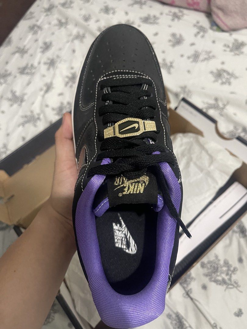 Nike Air Force 1 Black Purple Gold (Category: Sneakers) located in Manila. Submitted by kim-26 (Listing ID 1470825651, Image 3). Description: - Model: Nike Air Force 1 Low (Black/Purple) - Design details: White contrast stitching with vibrant purple inner lining and collar - Accents: Shiny patent leather swoosh, gold Nike Air tongue branding, and special gold lace dubrae - Comfort & Style: Unique graphic print on the insole - Packaging: Includes 