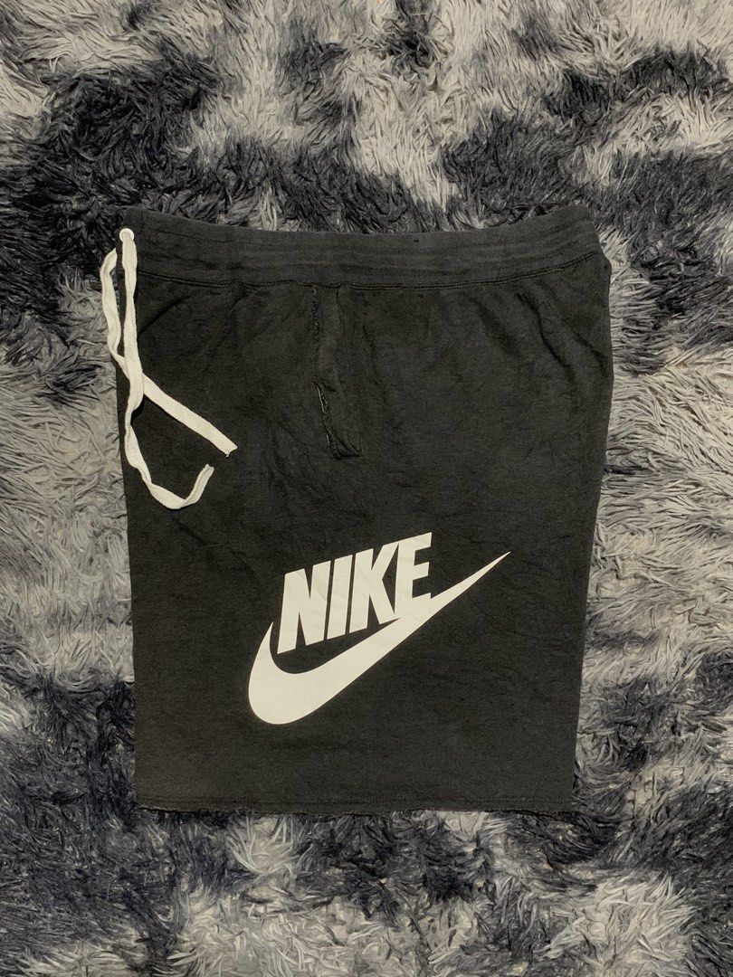 Nike Alumni Black Sweatshorts (Category: Shorts) located in Tayug. Submitted by cvcthrift (Listing ID 1470897584, Image 1). Description: W-33-38 L-20 VGUC CR-9/10 - Brand: Nike - Item: Sweatshorts - Color: Black with large white Nike swoosh and logo on left leg - Size: XL - Material: 58% cotton, 25% rayon body; 100% cotton pockets - Features: Adjustable drawstring waistband with white cords - Origin: Made in Thailand - Style Code: AR2376-010.