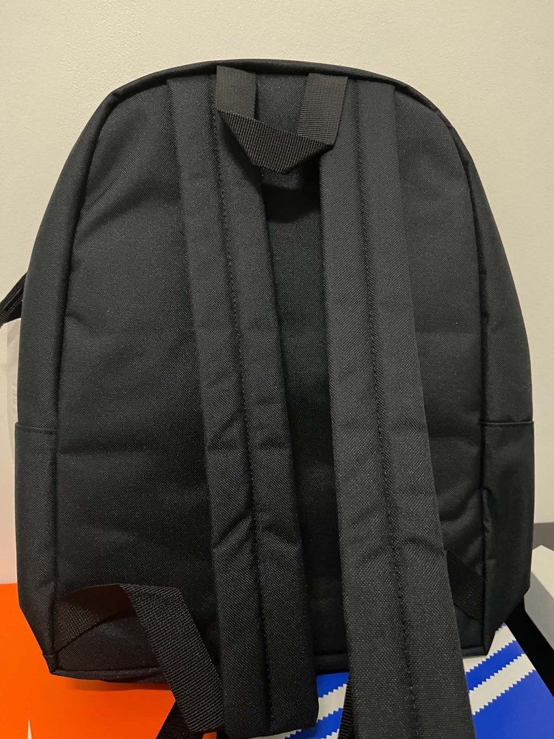 Nike Black Backpack with White Logo (Category: Backpacks) located in Caloocan City. Submitted by sarahastrid (Listing ID 1470866407, Image 3). Description: - Brand: Nike - Color: Black with large white front logo - Condition: Brand new, never used (original swing tag attached) - Features: Top zip closure, dark grey interior lining, adjustable padded back straps - Inclusions: Original product tag attached inside.