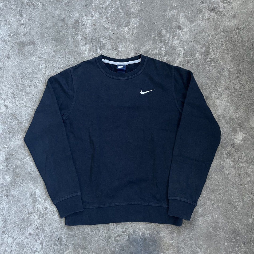 Nike Black Crewneck Sweatshirt Size S (Category: Coats, Jackets and Outerwear) located in Caloocan City. Submitted by fairfits (Listing ID 1470791023, Image 1). Description: - Brand: Nike - Style: Classic crewneck sweatshirt - Color: Solid black with white embroidered swoosh on chest - Size: Small - Material: Soft interior fleece lining with ribbed collar, cuffs, and hem - Condition: Excellent, clean minimalist piece - Perfect for: Everyday stree