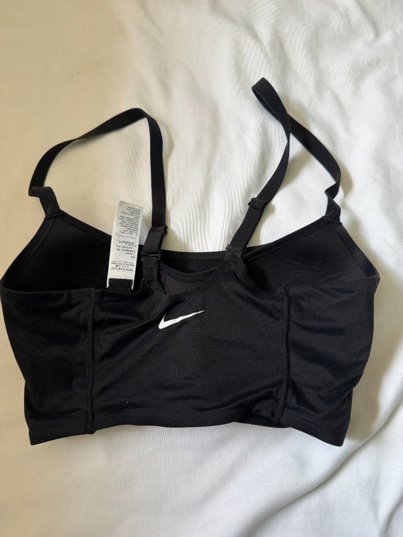 Nike Black Sports Bra Size S (Category: Activewear) located in Cebu City. Submitted by _t.rix (Listing ID 1470749944, Image 2). Description: - Brand: Nike - Color: Black with white Swoosh logo on back band - Size: S (fits true to size) - Condition: Clean, worn a few times - Features: Adjustable straps, removable padding, comfortable stretchy material.