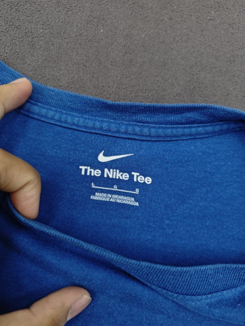 Nike Blue White Logo The Nike Tee (Category: Tshirts & Polo Shirts ) located in Bulacan. Submitted by pzj_thrift (Listing ID 1470778879, Image 2). Description: condition 9/10 color rate 9/10 issue white stain/ pinhole.