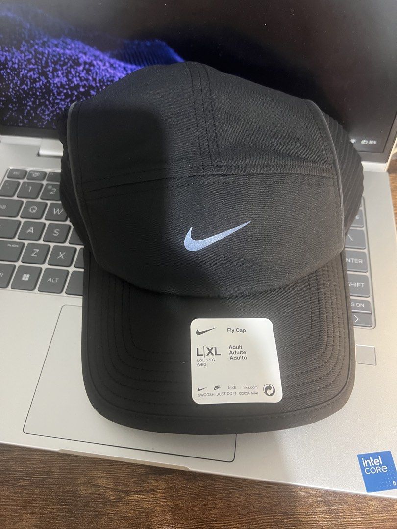 Nike Dri-FIT ADV Fly Cap Black L/XL (Category: Caps & Hats) located in Mandaluyong City. Submitted by markpalomo (Listing ID 1470755960, Image 1). Description: - Brand: Nike Dri-FIT ADV Fly Cap - Color: Black - Size: L/XL (Adults) - Condition: Brand new, unworn with original tags - Features: Lightweight material, adjustable back strap - Ideal for: Running, workouts, or casual daily wear .