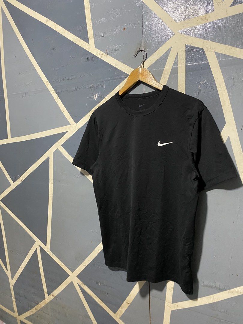 Nike Dri-FIT Black T-Shirt Medium (Category: Tshirts & Polo Shirts ) located in Polomolok. Submitted by marrssz (Listing ID 1470743871, Image 2). Description: - Brand: Nike - Style: Dri-FIT Crewneck T-Shirt - Color: Black with small white Swoosh logo - Size: Men's Medium (Standard Fit) - Material: 100% Lightweight & Breathable Polyester - Condition: Excellent / Pre-loved - Ideal for: Gym workouts, sports, or casual streetwear - Origin: Made in Ca
